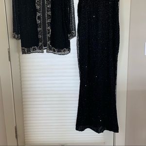 Black 2 piece evening dress.  Sleeveless full leng